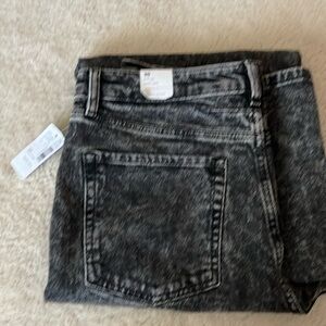 Brand new. Black distressed denim. Wide leg.